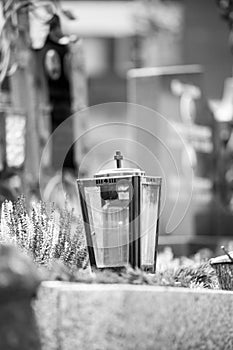 Candle / lantern at the cemetery, funeral, sorrow photo