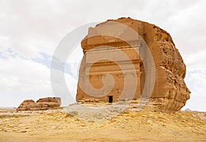 Tomb of Lihyan son of Kuza, known as Qasr AlFarid, the most iconic tomb in AlUla in the region of MadaÃ¢â¬â¢in Saleh, Saudi Arabia photo