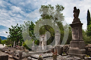 Tombs, statues and headstones in a graveyard