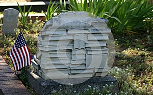 A tombstone carved for an avid reader. photo