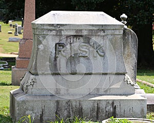 Tombstone with the name Risk on it