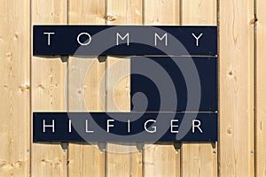 Tommy Hilfiger logo on a wall