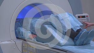 Tomographic Scanning Platforms. Mri Scanner, Tomograph With Patient Getting