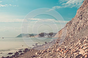 Toned image of Sukko village from the rocky shore of the Black sea in Krasnodar region, Russia.