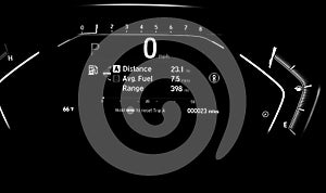 Toned photo illuminated instrument panel dashboard on new car with very low milage at only 23 miles odometer, digital display of