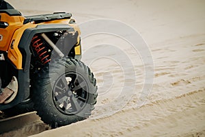 Toned photo low pressure tire angled shoulder tread design ATV all-terrain vehicle improved grip, traction, shock absorber