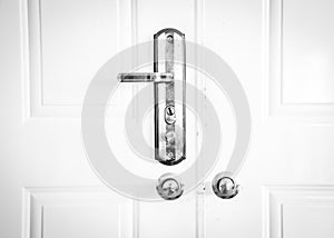 Toned photo metal entrance door with rustic keyed entry door handle at apartment in Hanoi, standard door handle with knob lock