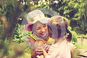 Toned Summer portrait of little girls