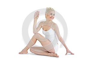 Toned woman in Ardha Matsyendrasana position