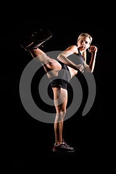 Toned young fitness woman working out.