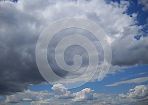 Tones of grey and white within rainy cloud