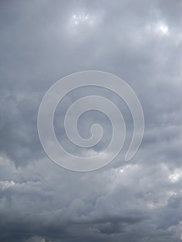 Tones of grey and white within rainy cloudscape