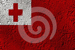 Tonga flag on the background texture. Concept for designer solutions