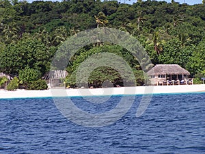 Tonga Island shoreline Huts 2