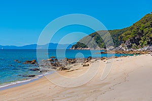 Tonga quarry campsite beach at Abel Tasman national park in New Zealand