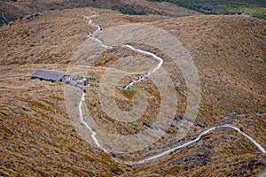 TONGARIRO NATIONAL PARK, NEW ZEALAND - 30 DECEMBER 2016: People trekking on Alpine crossing trail, Tongariro, New Zealand