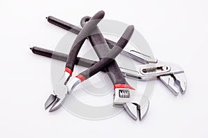 Tongs, tongs with flat, clammy ends on a white background. With black rubber on the handle, it becomes more comfortable