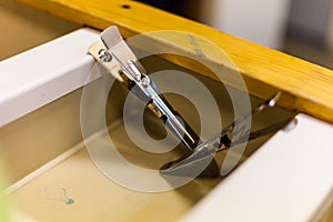 Tongs for working with photos. Manual optical printing of photos in darkroom