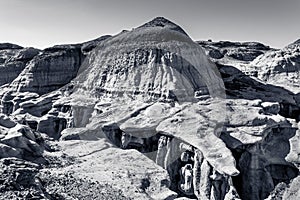 Tongue and grooves jut across the abyss of the Bisti Badlands