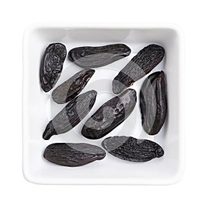 Tonka beans, Tonkin or Tonquin beans, in a white bowl