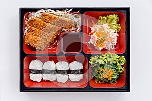 Tonkatsu Bento Served with Japanese Rice Wraped, Cut Tonkatsu and Japanese-Style Barbecue Sauce, Seaweed with Ebiko and Kani Salad