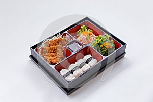 Tonkatsu Bento Served with Japanese Rice Wraped, Cut Tonkatsu and Japanese-Style Barbecue Sauce, Seaweed with Ebiko and Kani Salad