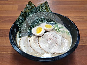 Tonkotsu ramen, or Hakata ramen, noodle dish originated in Fukuoka, Kyushu, Japan. Soup broth based on pork bones.