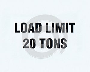 A tonnage limit posted on a bridge