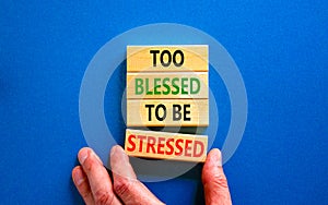 Too blessed to be stressed symbol. Concept words Too blessed to be stressed on wooden blocks. Beautiful blue table blue background