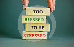 Too blessed to be stressed symbol. Concept words Too blessed to be stressed on wooden blocks. Beautiful grey table grey background