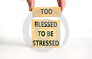 Too blessed to be stressed symbol. Concept words Too blessed to be stressed on wooden blocks. Beautiful white table white