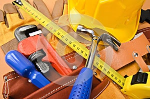 Tool belt with tools on light background