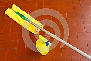 A tool for dusting the floors and the cleaner to wash it