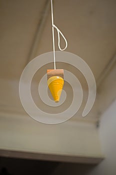 Tool hanging from ceiling
