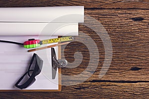 Tool kit on wooden background