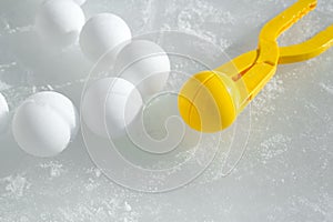 A tool for modeling and making snowballs from snow for children`s games