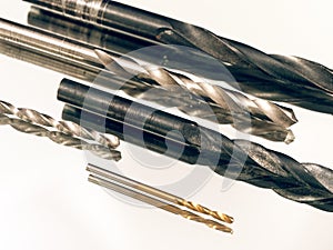 Metal drill in assortment on a white background