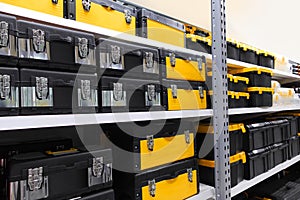 Tool Storage Box and Tool Chests Protective cases for tools and devices.colorful plastic Storage boxes on Shelf for accessories or