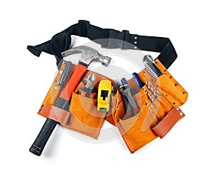 Toolbelt with various tools on white