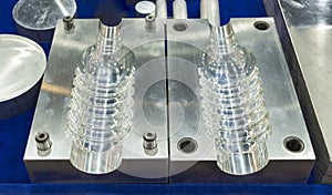 Tooling for plastic bottle injection photo