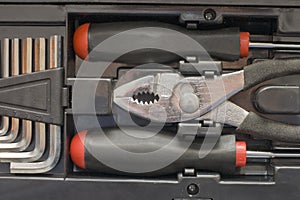 Toolkit of various tools in the box photo