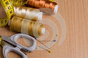 Tools and accessories for sewing. Sewing thread, scissors, pins
