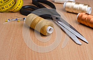 Tools and accessories for sewing. Sewing thread, scissors, pins