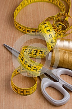 Tools and accessories for sewing. Sewing thread, scissors, tailo