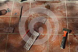 Work tools leaning on the pavement ready to be used