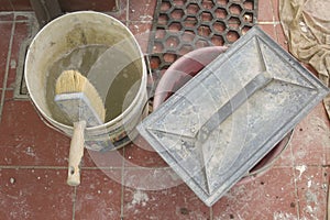 Work tools leaning on the pavement ready to be used