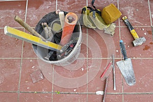 Work tools leaning on the pavement ready to be used