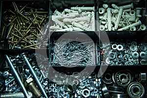 Tools for building. A lot of little nails. A box with tools for the master.