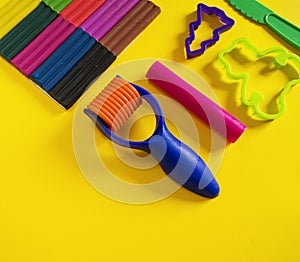 Tools for creative hobbies. Molding of plasticine, stack, shape, rolling pin.