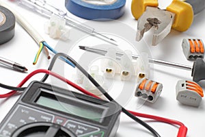 Tools and equipment of an electrical engineer or professional worker on a white background